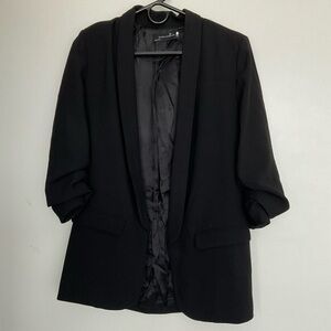 Black Zara blazer with rolled up sleeves